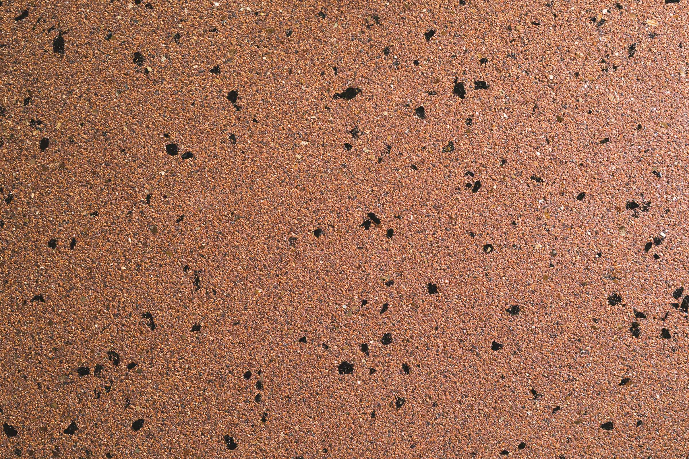 Enduit StoSuperlit K 0,8 avec sa texture ponctuée d’éclats de mica