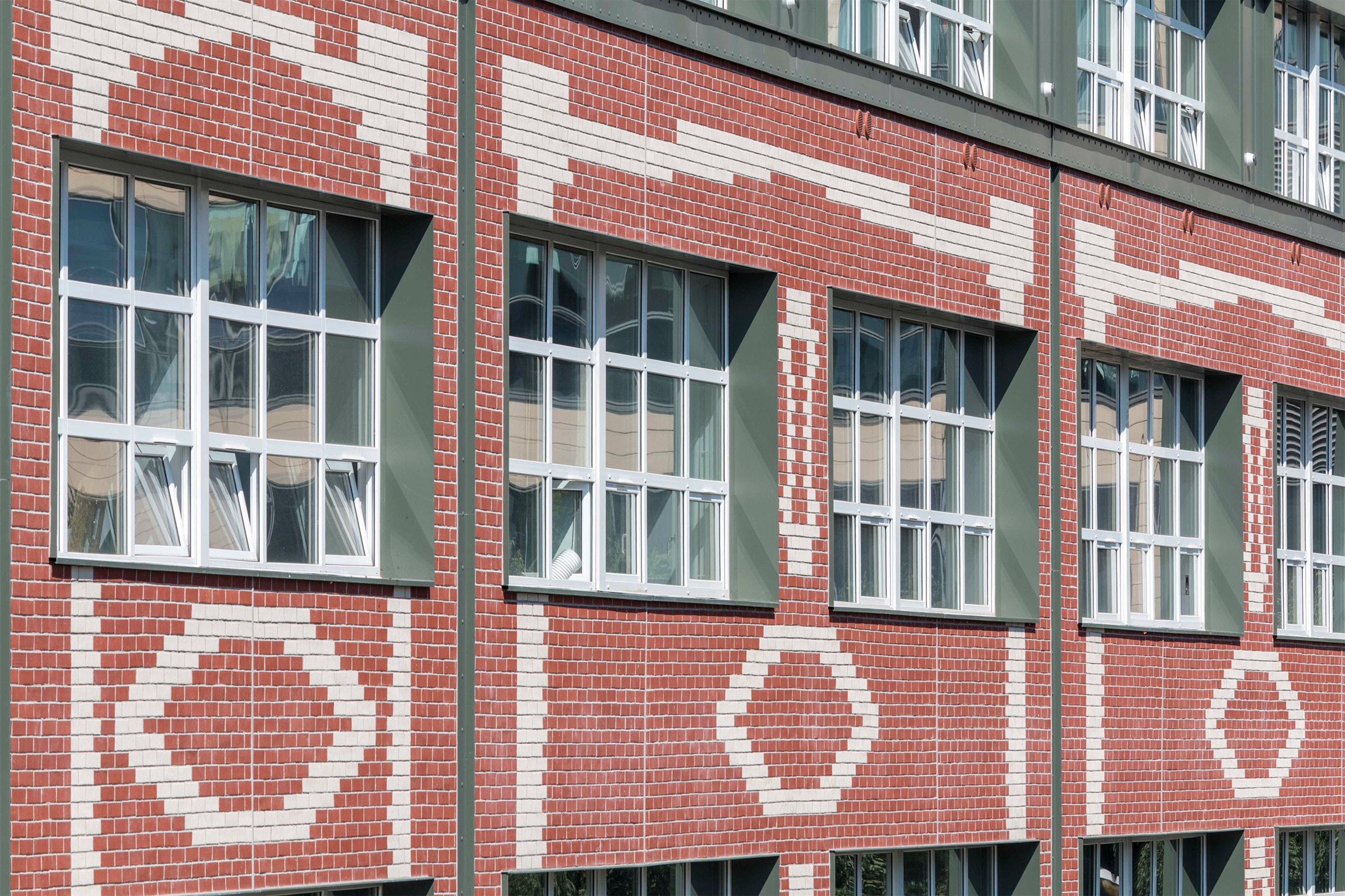 Façade isolée par l'extérieur, revêtue de StoBrick